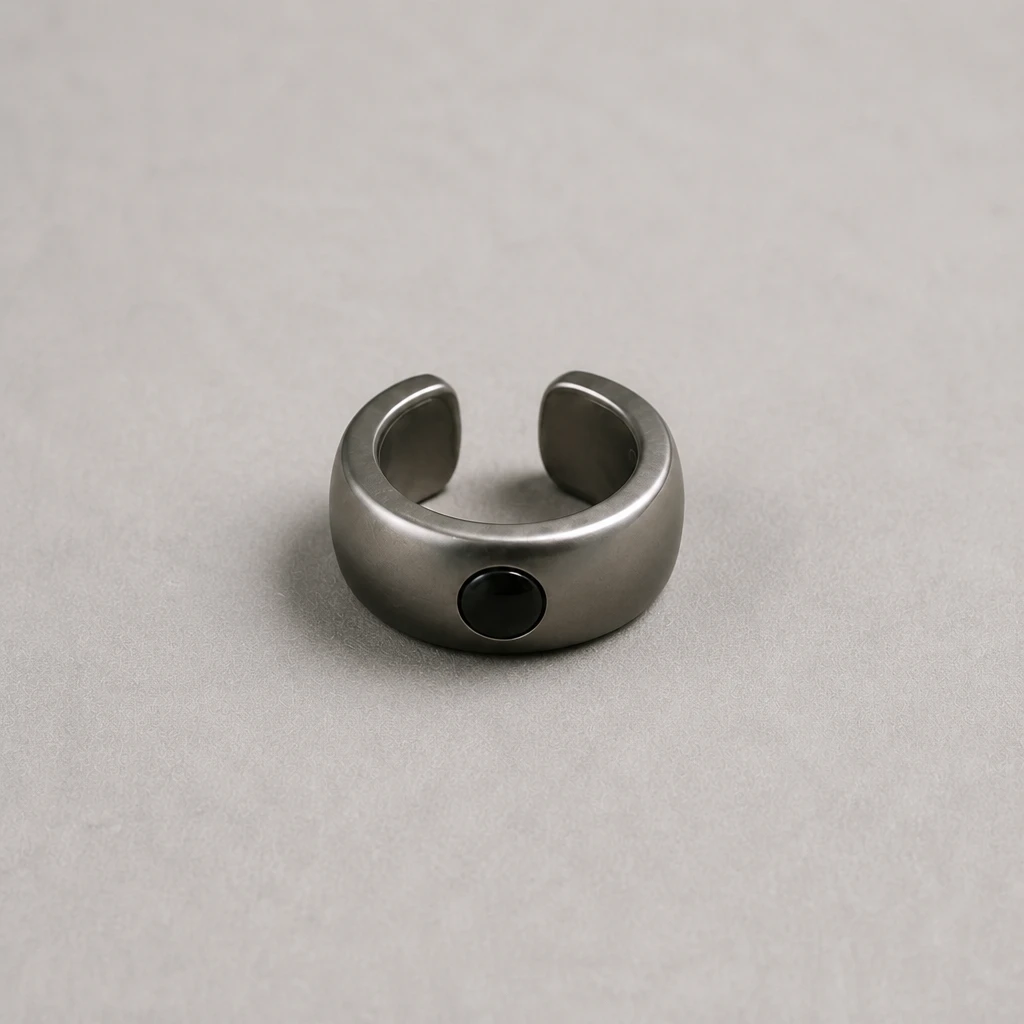 Mote Cuff-01 titanium ear cuff with sapphire detail